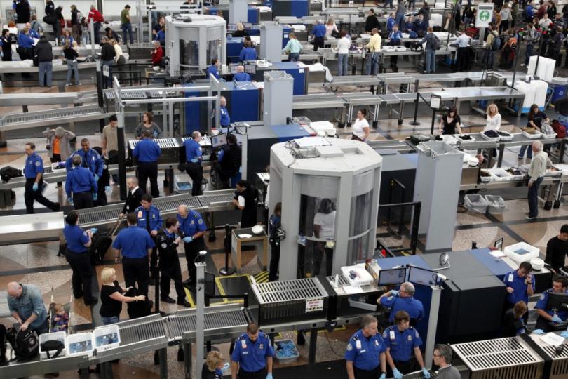 62802-tsa-workers-carry-out-security-checks-at-denver-international-airport